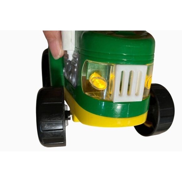 Green and Yellow Plastic Toy Tractor With Working Lights and Sound - Picture 9 of 10